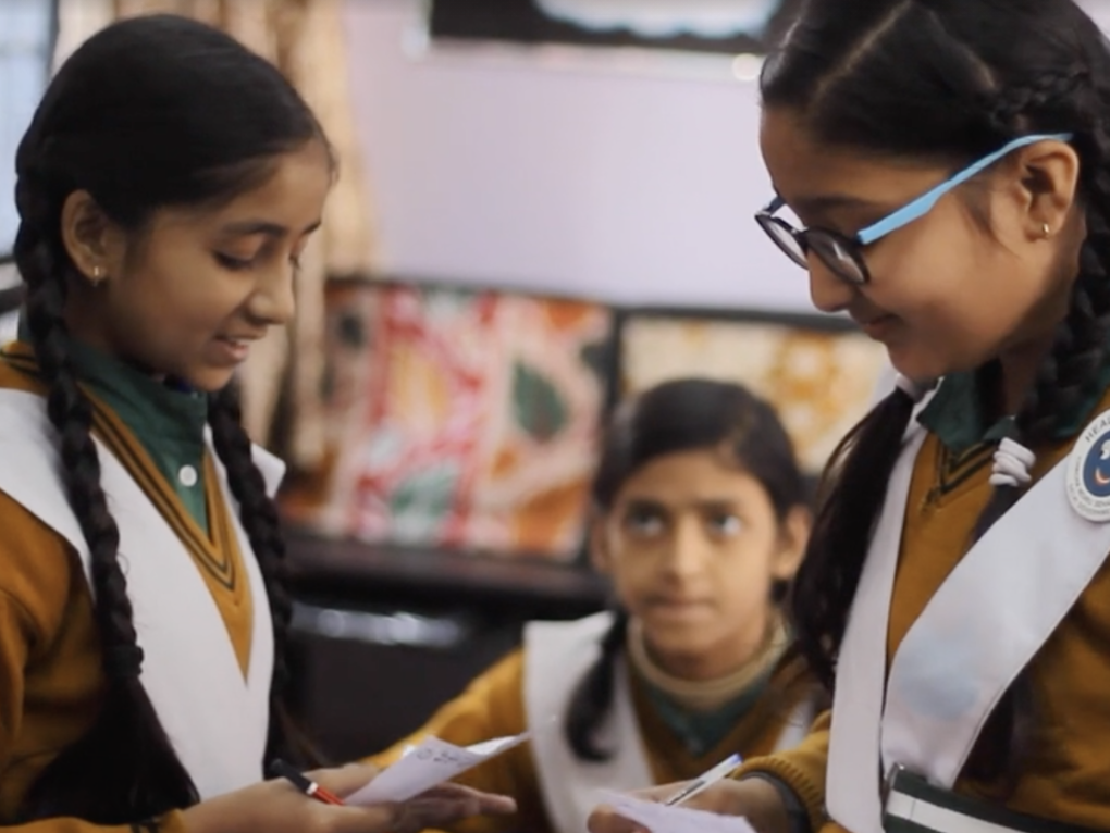 Young girls reading .