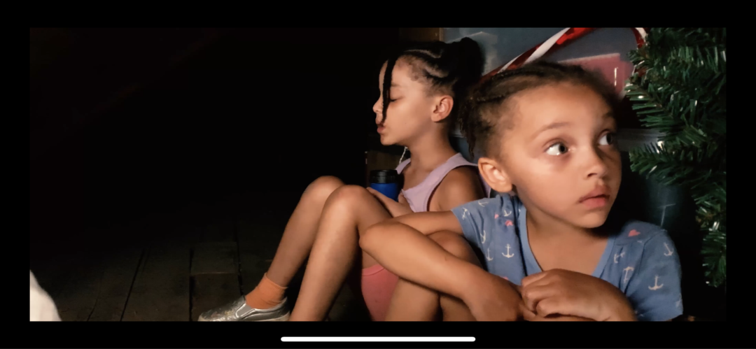 two girls hiding